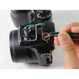 Замена вспышки Fujifilm Finepix S1000fd на пружине